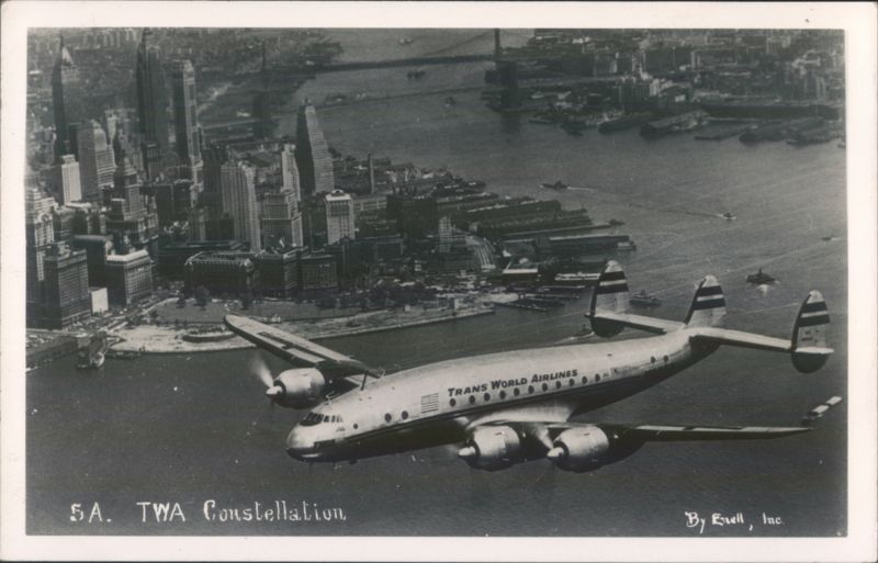 TWA Constellation Airplane Over New York City Skyline