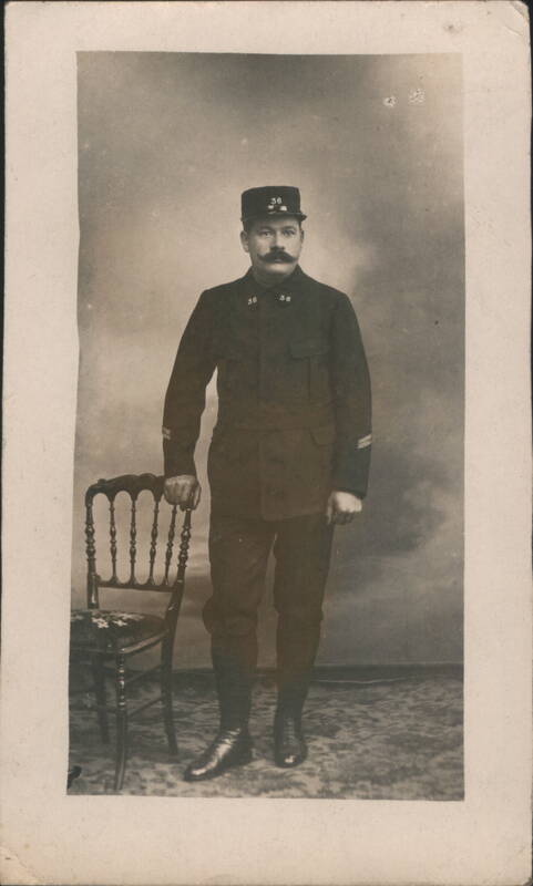 Man in Uniform with Number 36 on Cap and Collar People in Uniform