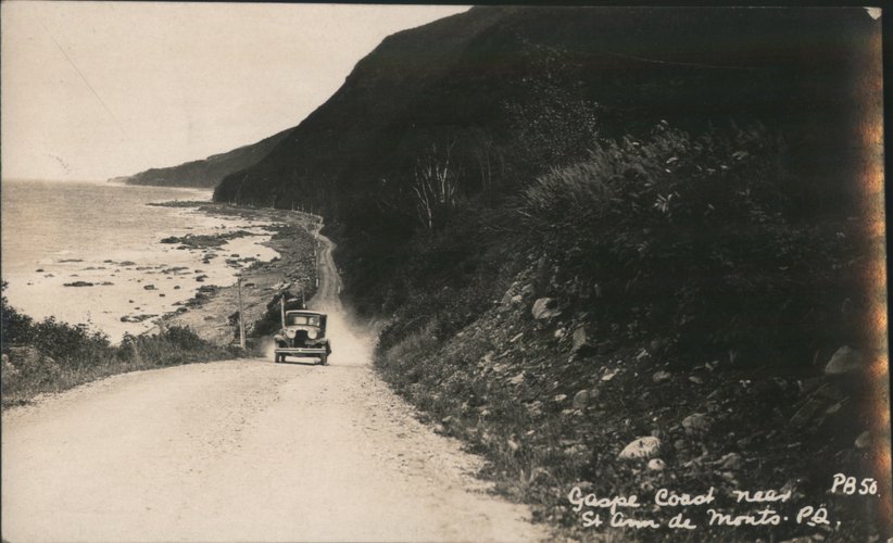 Car on Coastal Road near Sainte-Anne-des-Monts QC Canada
