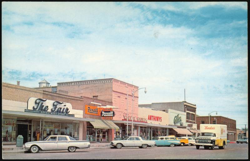 Sixth Street Business Section with Stores & Borden's Truck Brownfield Texas