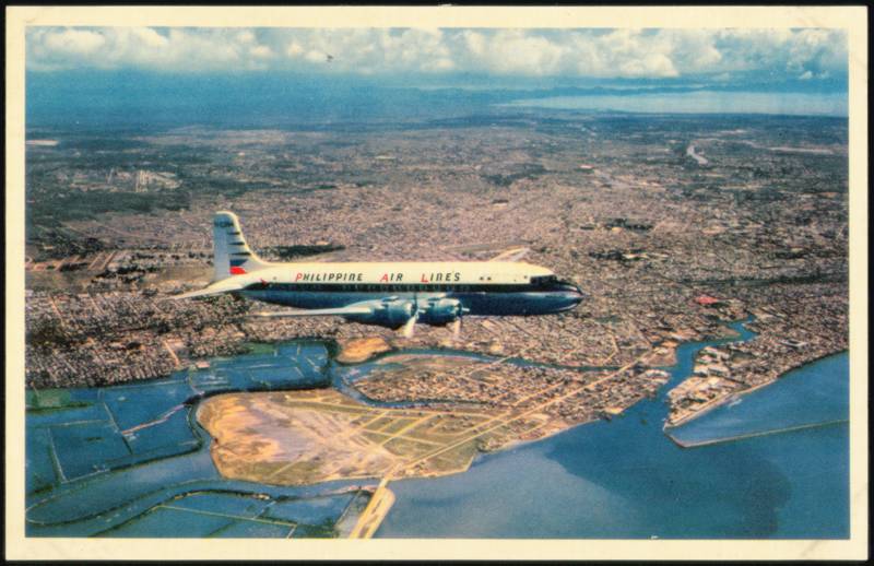 Philippine Air Lines DC-6 Flying Over Manila Philippines