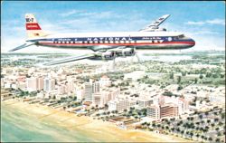 National Airlines DC-7 Star Airliner in Flight Postcard