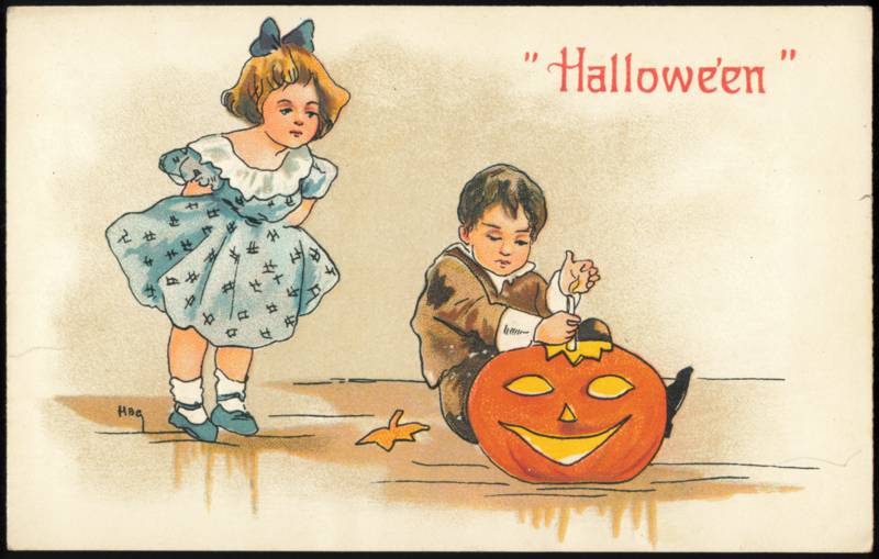 Halloween, Children Lighting Jack-O'-Lantern Pumpkin