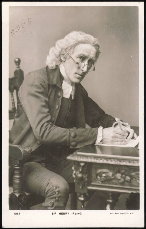 Sir Henry Irving Seated at Desk in Costume