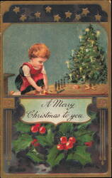 A Merry Christmas to You, Child Playing with Toys by Tree Postcard