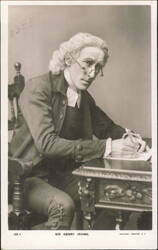 Sir Henry Irving Seated at Desk in Costume Postcard