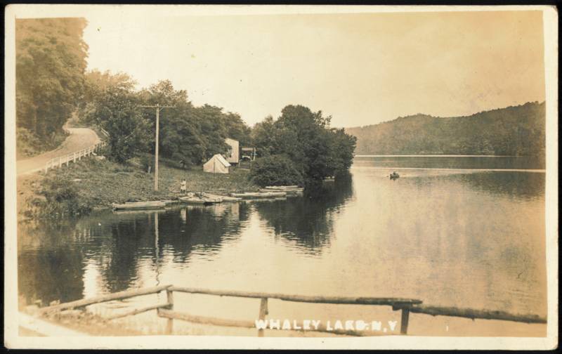Whaley Lake Shoreline View with Boats and Camp Tent New York