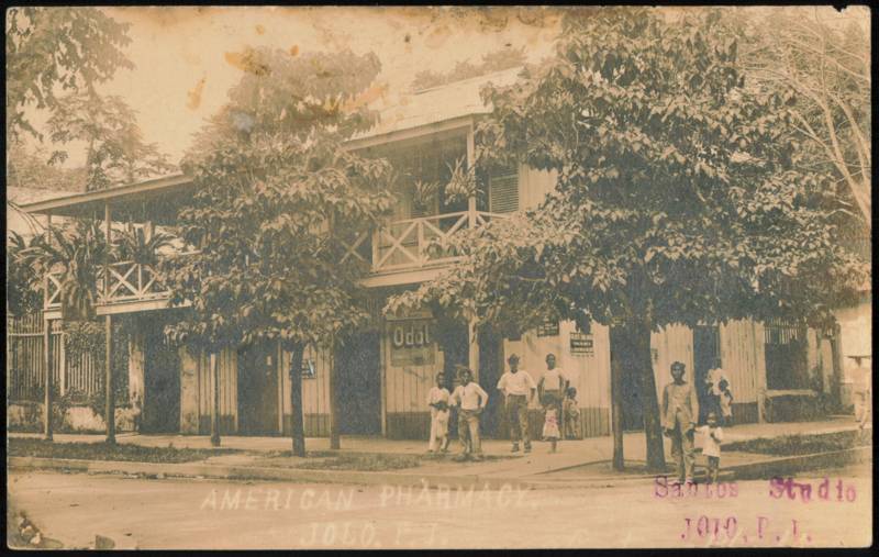 American Pharmacy Building with Local Residents Jolo Philippines
