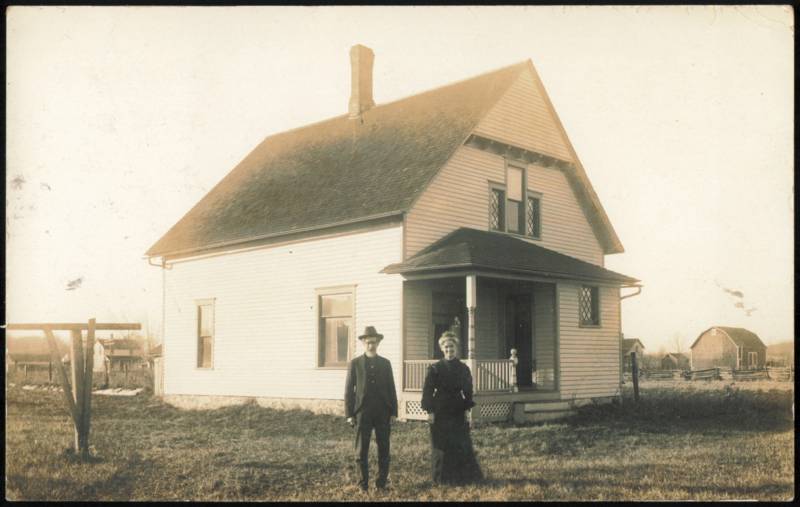 Couple Standing in Front of Rural Frame House Hopkins Michigan