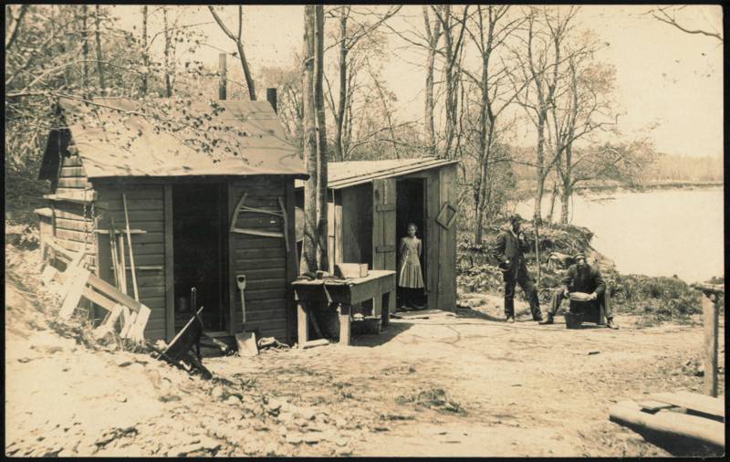 Two Men and a Girl at a Rustic Camp, Gold Panning Mining