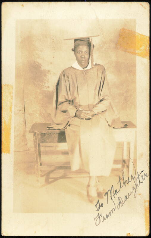 African American Woman Graduate in Cap and Gown Black Americana