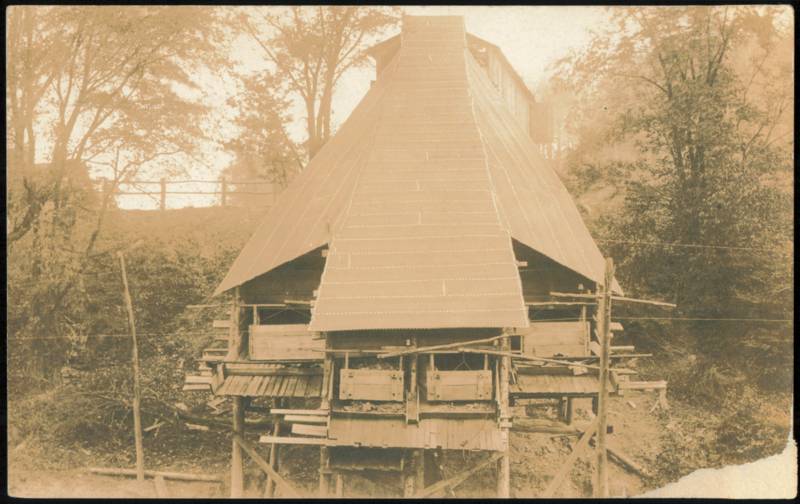 Large Wooden Mine Tipple or Mill Structure in Forest