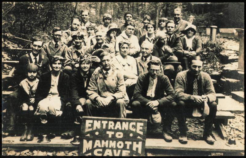 Tour Group with Lanterns at Entrance to Mammoth Cave Kentucky