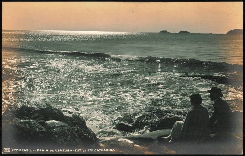 Praia de Ubatuba Ocean Waves, Couple on Rocks Brazil