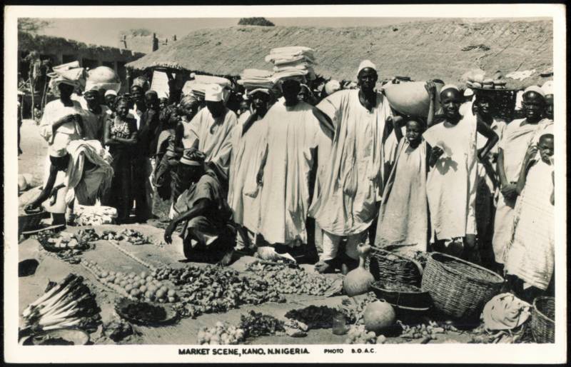 Outdoor Market Scene with Local Vendors and Produce Kano Nigeria