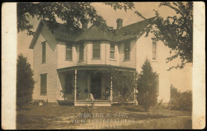 Victorian Frame House with Porch and Dog Moran Kansas