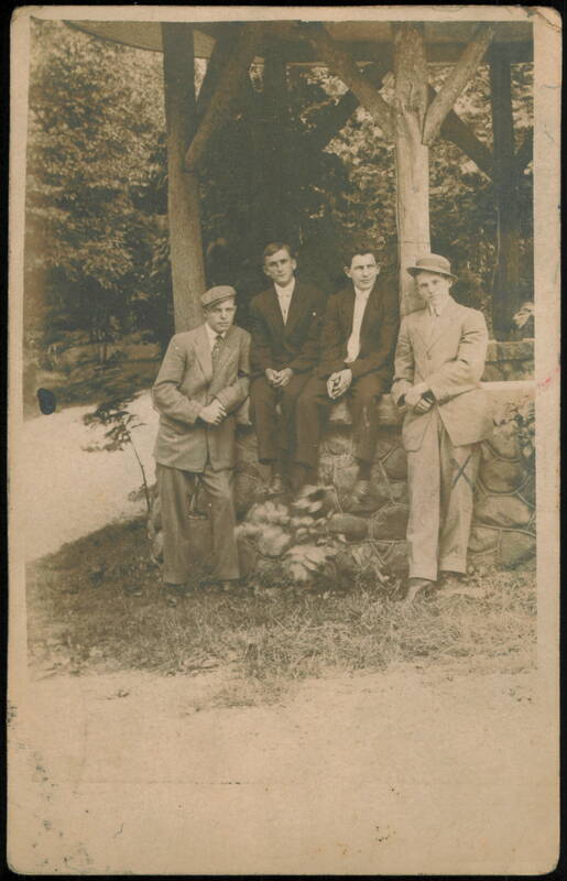 Four Young Men in Suits at Rustic Stone Gazebo Kokomo Indiana
