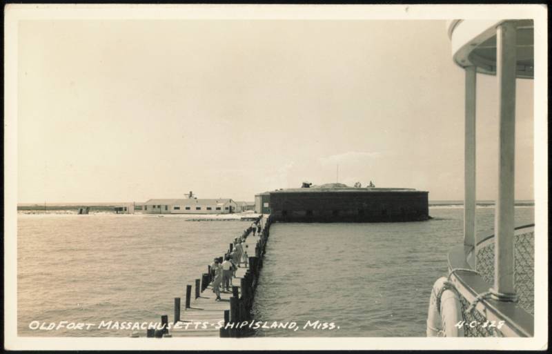 Old Fort Massachusetts and Pier with Visitors Ship Island Mississippi