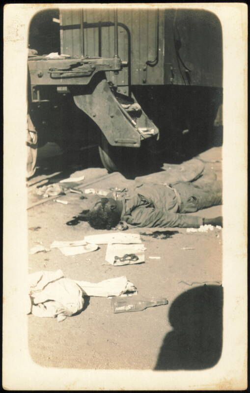 Mexican Revolution, Dead Man Lying Beside Rail Car Mexico