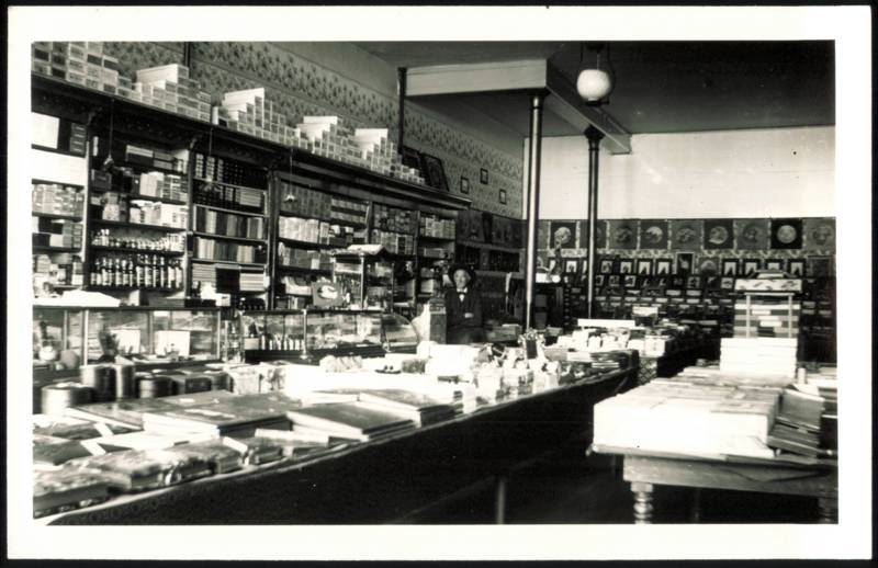 General Store Interior with Clerk and Merchandise Occupational