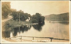 Whaley Lake Shoreline View with Boats and Camp Tent Postcard