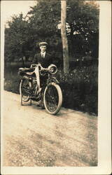 Man with Early Indian Motorcycle and Lily Dale Pennant Postcard