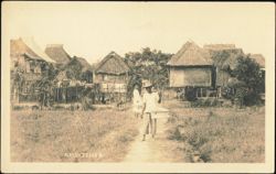A Fish Seller with Carrying Pole and Thatched Huts Postcard