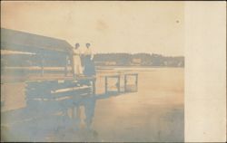 Two Women Standing on Lake Dock by Covered Pier Postcard