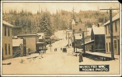 Snowy Downtown Street Scene with Lemp's Hotel Postcard