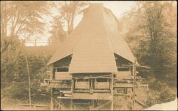 Large Wooden Mine Tipple or Mill Structure in Forest Postcard