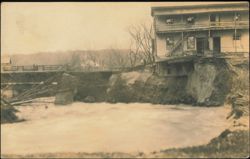 Raging Flood Waters Undermining Riverbank Building Postcard