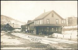 Railroad Station Depot with Men on Platform in Winter Postcard