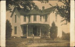 Victorian Frame House with Porch and Dog Postcard