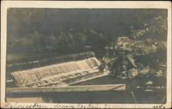 Melones Dam with Water Cascading Over Spillway Postcard