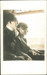 Man and Boy Looking Out Window Postcard