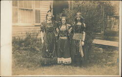 Three Girls in Native American Themed Costumes Postcard