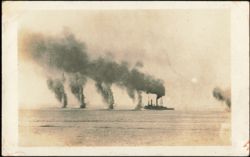 Naval Ship Firing Guns at Sea Postcard