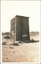 "Alone On The Desert" Rustic Wooden Outhouse Postcard