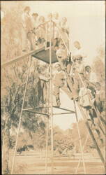 Children Posing on Tall Playground Slide Postcard
