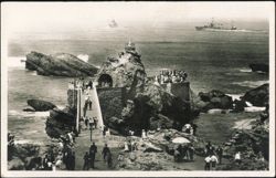 Le Rocher de la Vierge with Crowd & Naval Warships Postcard