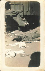 Mexican Revolution, Dead Man Lying Beside Rail Car Postcard