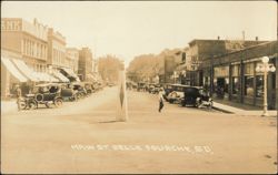 Main Street with Vintage Automobiles & Storefronts Postcard