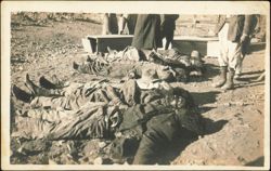 Mexican Revolution Casualties Laid Out on Ground Beside Coffins Postcard