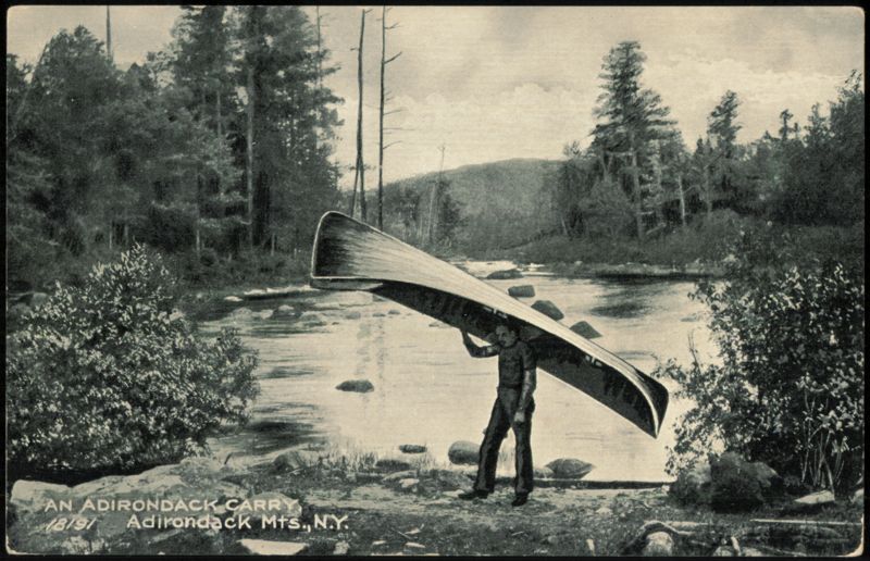 Man Portaging Canoe, An Adirondack Carry New York