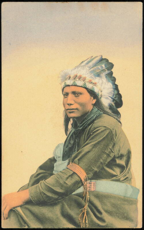 Native American Man in Traditional Feathered Headdress