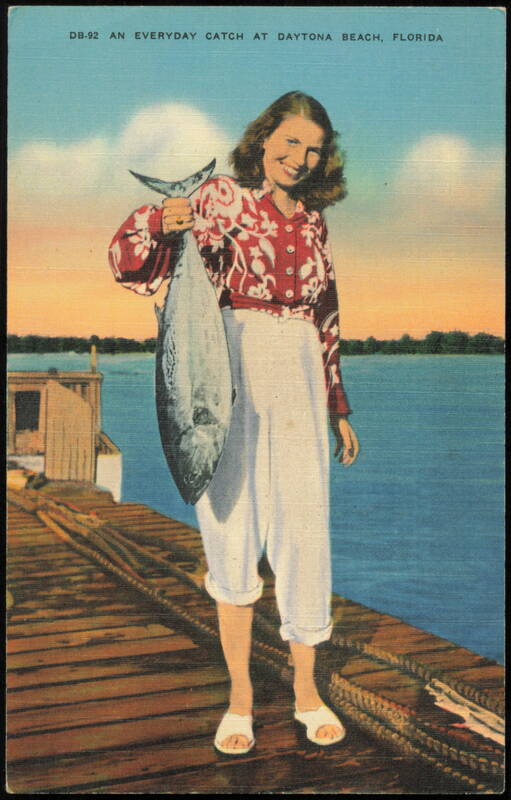 Woman with Large Fish Catch on the Pier Daytona Beach Florida
