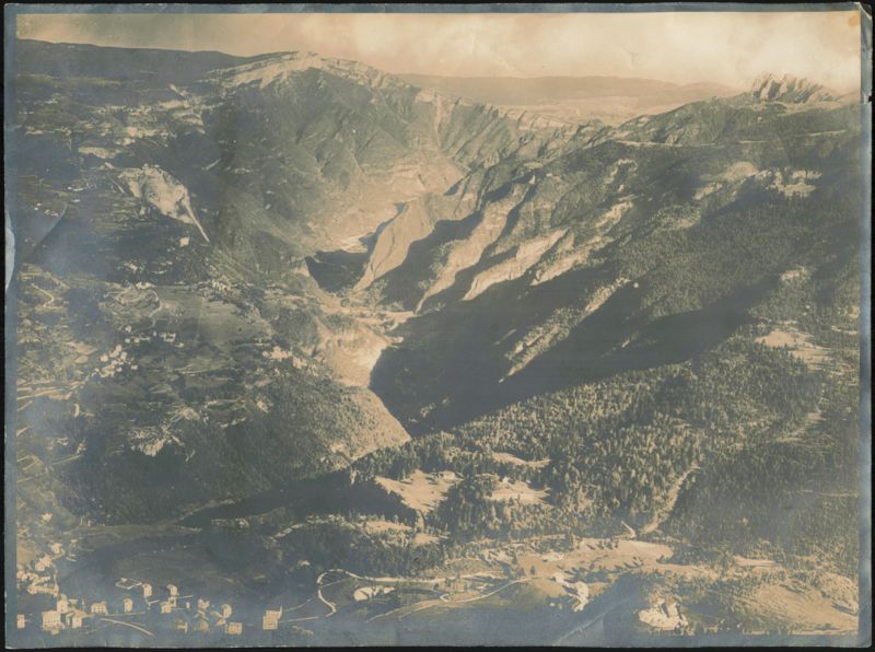 Aerial View of Mountain Valley and Forest Landscape