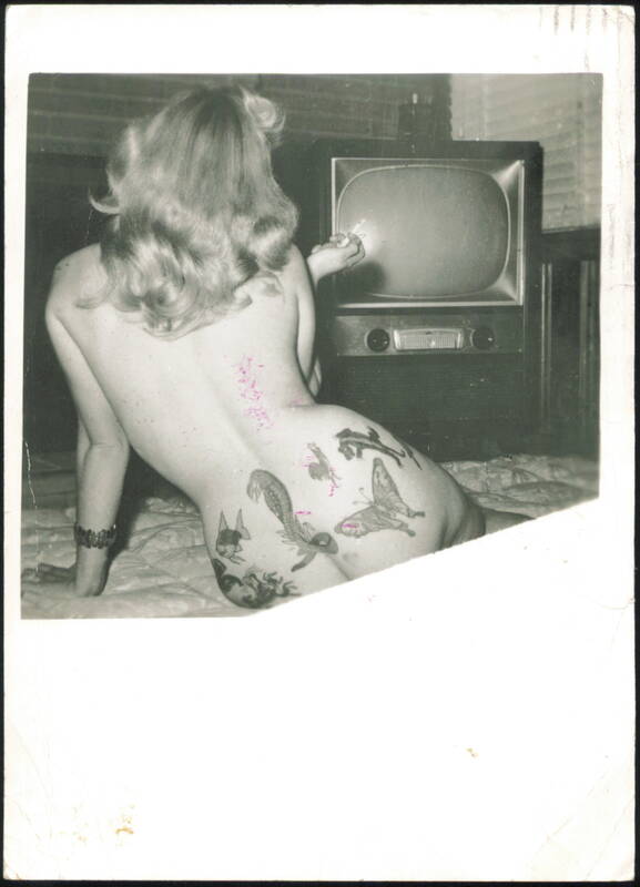 Woman with Tattoos Watching Television Photographic Art