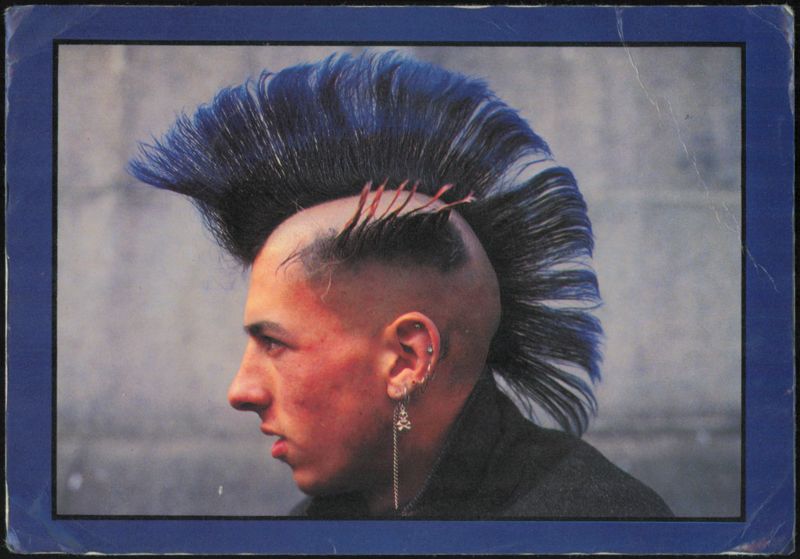 Punk Rocker with Blue Mohawk Hairstyle in London United Kingdom