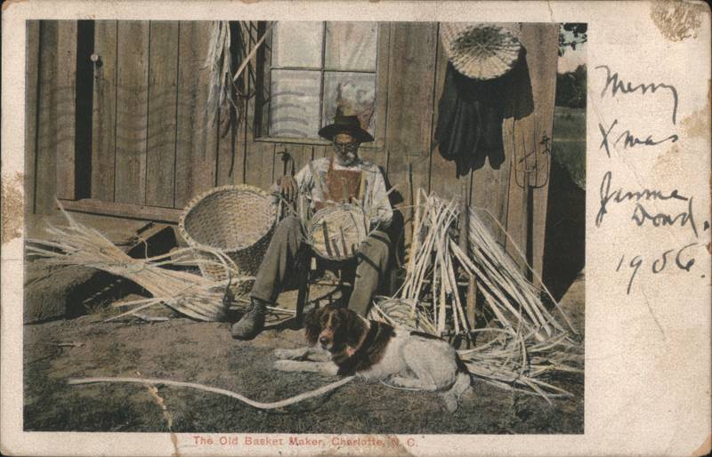 The Old Basket Maker, Charlotte, N.C., Weaving with Dog
